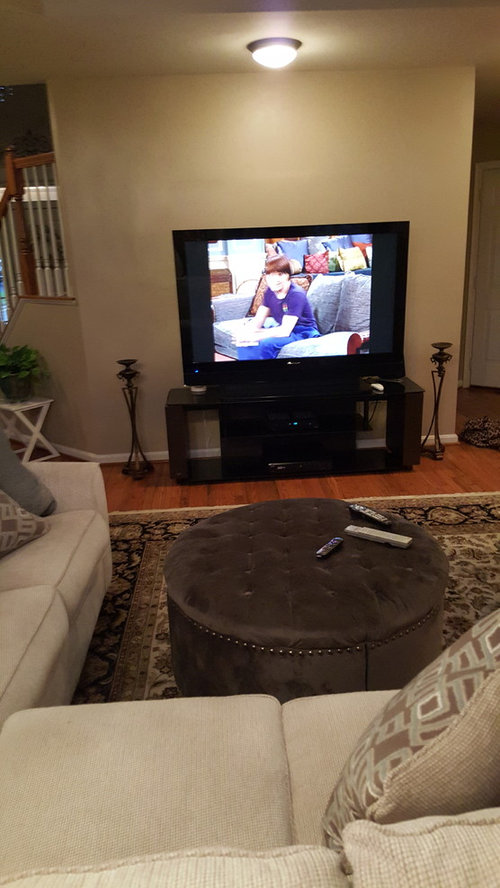 Sofa backs to fireplace