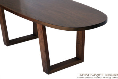 The Mod Century Oval Dining Table in Walnut