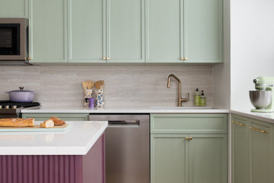 Eat-in kitchen - mid-sized transitional light wood floor eat-in kitchen idea in New York with an undermount sink, green cabinets, quartz countertops, beige backsplash, porcelain backsplash, stainless steel appliances, an island and white countertops