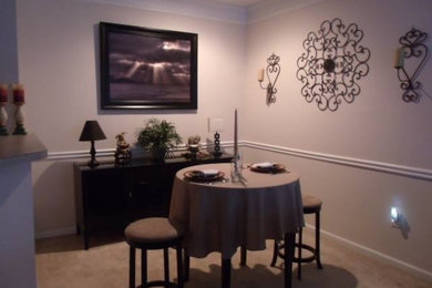 Example of a classic dining room design in Atlanta