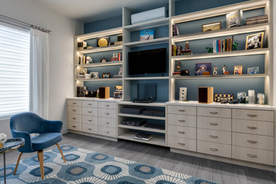 Inspiration for a mid-sized 1950s guest porcelain tile and gray floor bedroom remodel in Phoenix with blue walls