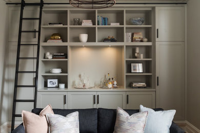 Photo of a large contemporary formal open concept living room in Melbourne with beige walls, light hardwood floors, no tv and beige floor.