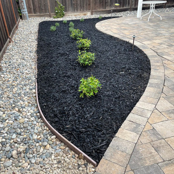 Planter, River Rock and Paver Patio