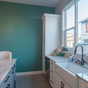 Heart of the Home” Kitchen with marble basket weave mosaic backsplash