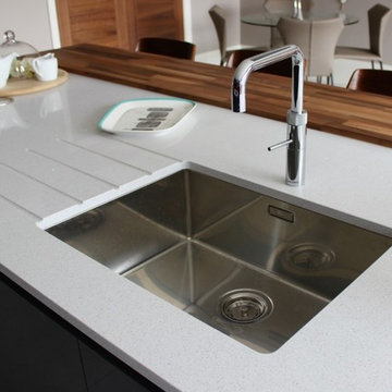 Dark grey kitchen with Quooker hot water tap