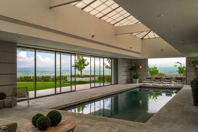 Large trendy indoor tile and rectangular lap pool photo in San Diego