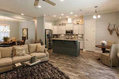 Mid-sized arts and crafts open concept ceramic tile family room photo in Miami with blue walls and no tv
