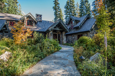 Mountain style home design photo in Sacramento