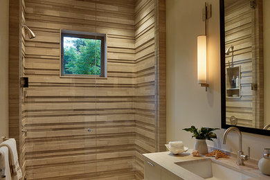 Mid-sized trendy 3/4 brown tile porcelain tile and beige floor alcove shower photo in San Francisco with flat-panel cabinets, beige cabinets, a two-piece toilet, beige walls, an undermount sink, wood countertops and a hinged shower door