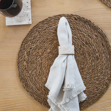 Natural Table Setting With Woven Placemat and Linen Napkin