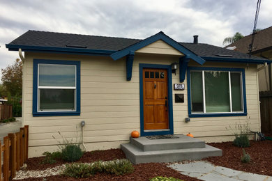 Inspiration for a craftsman beige one-story exterior home remodel in San Francisco