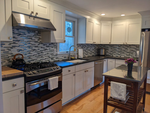 Kitchen Backsplash.- Before and After!