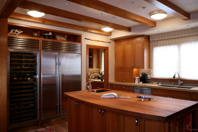 Example of a trendy kitchen design in San Francisco with an island