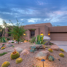 landscaping with gravel, flagstone and boulders