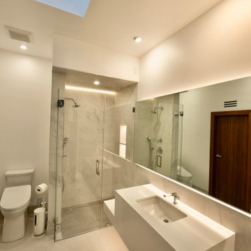 Skylit Guest Bath, Floating Stone Vanity