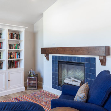 Fireplace was renovated with a new face, mantle, and blue tile