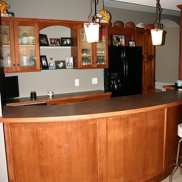 Waukesha Lower Level Remodel with Custom Built Curved Bar
