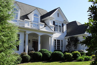 Elegant white two-story concrete fiberboard exterior home photo in Atlanta