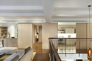 Living room - mid-sized contemporary open concept dark wood floor living room idea in New York with white walls and no fireplace