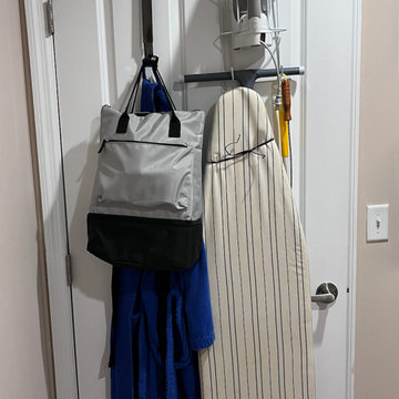 Over-the-door iron and ironing board rack saves space