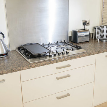 Neutral colours and chic design features, a modern twist to a classic kitchen
