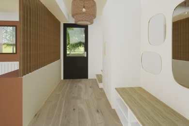 Ejemplo de hall contemporáneo de tamaño medio con paredes beige, suelo de madera clara, puerta simple, puerta gris y suelo marrón