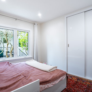 Bedroom with New Sliding Closet Doors and Storage Organizers – Kerrisdale Vancou