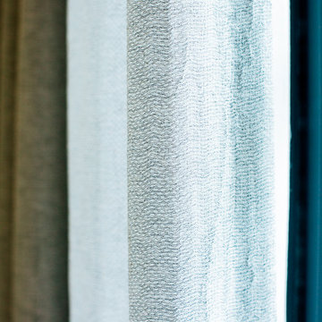 Functional Drapes with 2-Finger Pinch Pleat on a Matte Black Traverse Rod
