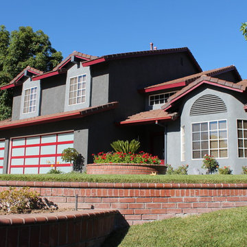 Seamless Box Style Gutters, Colonial Red, Storm Gray Downspouts