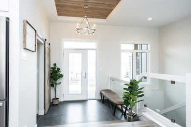Example of a transitional entryway design in Other