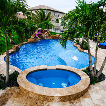 Tropical Style Pool With Rock Waterfall and Raised Spa in Delray Beach, Florida
