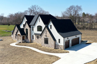 Example of a transitional exterior home design in Cleveland
