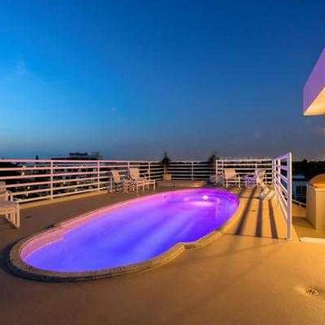 Rooftop Swimming Pool & Deck overlooking beach
