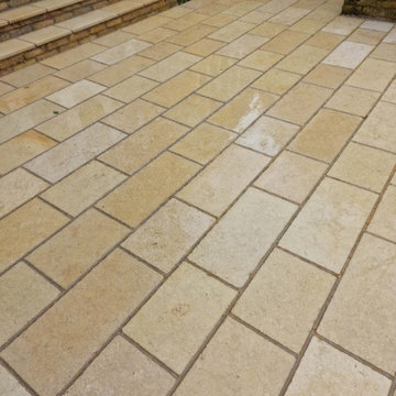 Deep Cleaning a Faded Limestone Patio in Lincoln
