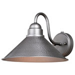 Vaxcel - Outland 12" Outdoor Wall Light Brushed Pewter - Designed with stately, yet rustic sophistication, the Outland collection is a solid choice for your outdoor space. The finish gives this barn light a warm and inviting elegance, and the finish inside the shade adds to the charm. This fixture is dark-sky compliant and will complement any industrial, cottage, modern country, or farmhouse style home. Dusk to dawn photo cell automatically turns fixture on in the dark and off in the light for added safety and security, saving energy during daylight hours. This outdoor wall light is ideal for your porch, entryway, garage, or any other area of your home.