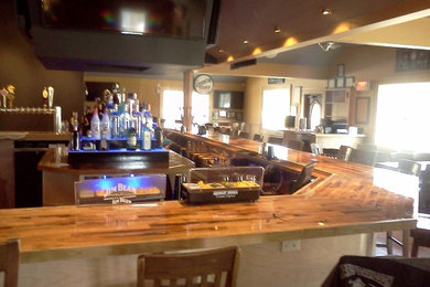 Inspiration for a home bar remodel in New York