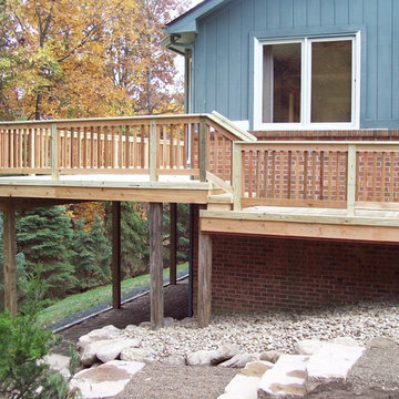 LARGE BASIC PRESSURE TREATED DECK WITH CEDAR INFILL AND BALUSTERS