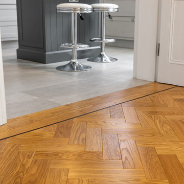 Natural Oiled Herringbone Parquet -Double border with wenge inlay