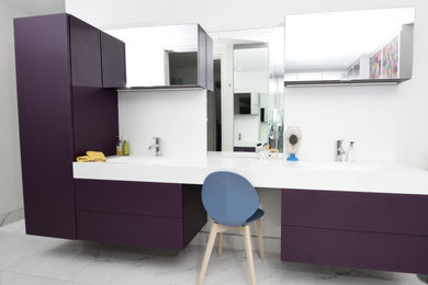 Example of a large trendy master white tile and porcelain tile porcelain tile, white floor and double-sink bathroom design in Toronto with flat-panel cabinets, purple cabinets, a one-piece toilet, white walls, an integrated sink, quartzite countertops, a hinged shower door, white countertops and a floating vanity