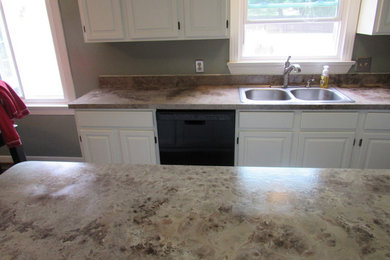 Mid-sized transitional galley eat-in kitchen photo in DC Metro with raised-panel cabinets, white cabinets and an island