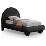 Meridian Furniture - Madrid Upholstered Bed, Black, Twin, Velvet - Transform your bedroom with the bold and sophisticated charm of the Madrid black velvet upholstered twin bed. Inspired by classic Art Deco design, this bed showcases a striking arched headboard and rounded edges for a unique, sculptural look. The luxurious velvet upholstery adds a layer of softness and warmth, making it a stunning centerpiece that combines artful design with everyday comfort.