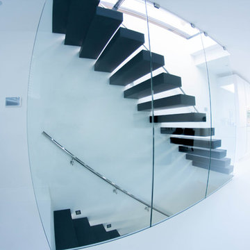 Modern Floating Staircase with Black Treds