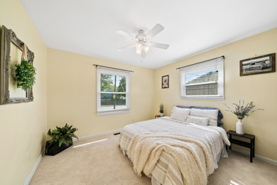 Bedroom - farmhouse bedroom idea in Cleveland