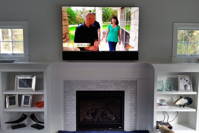 Minimalist family room photo in Boston