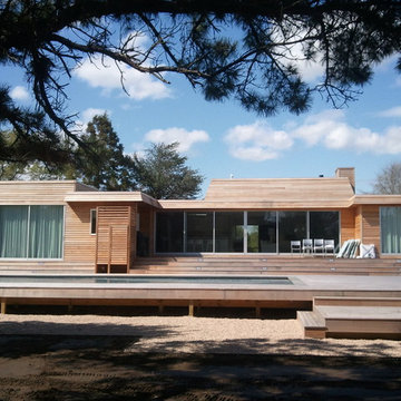 Contemporary with Wood Decking Throughout