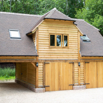 Triple bay two storey oak barn garage and home office studio in West Sussex