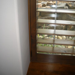 Custom Frame and Custom Color Knotty Alder Shutters - Interior Shutters