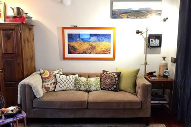 Example of an eclectic living room design in Other