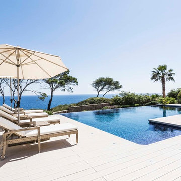 Poolumrandung mit massiven WPC Terrassendielen von MYDECK