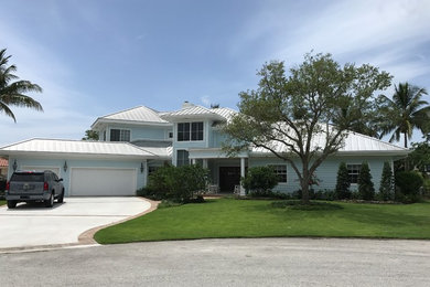 Inspiration for a traditional front yard brick landscaping in Miami.